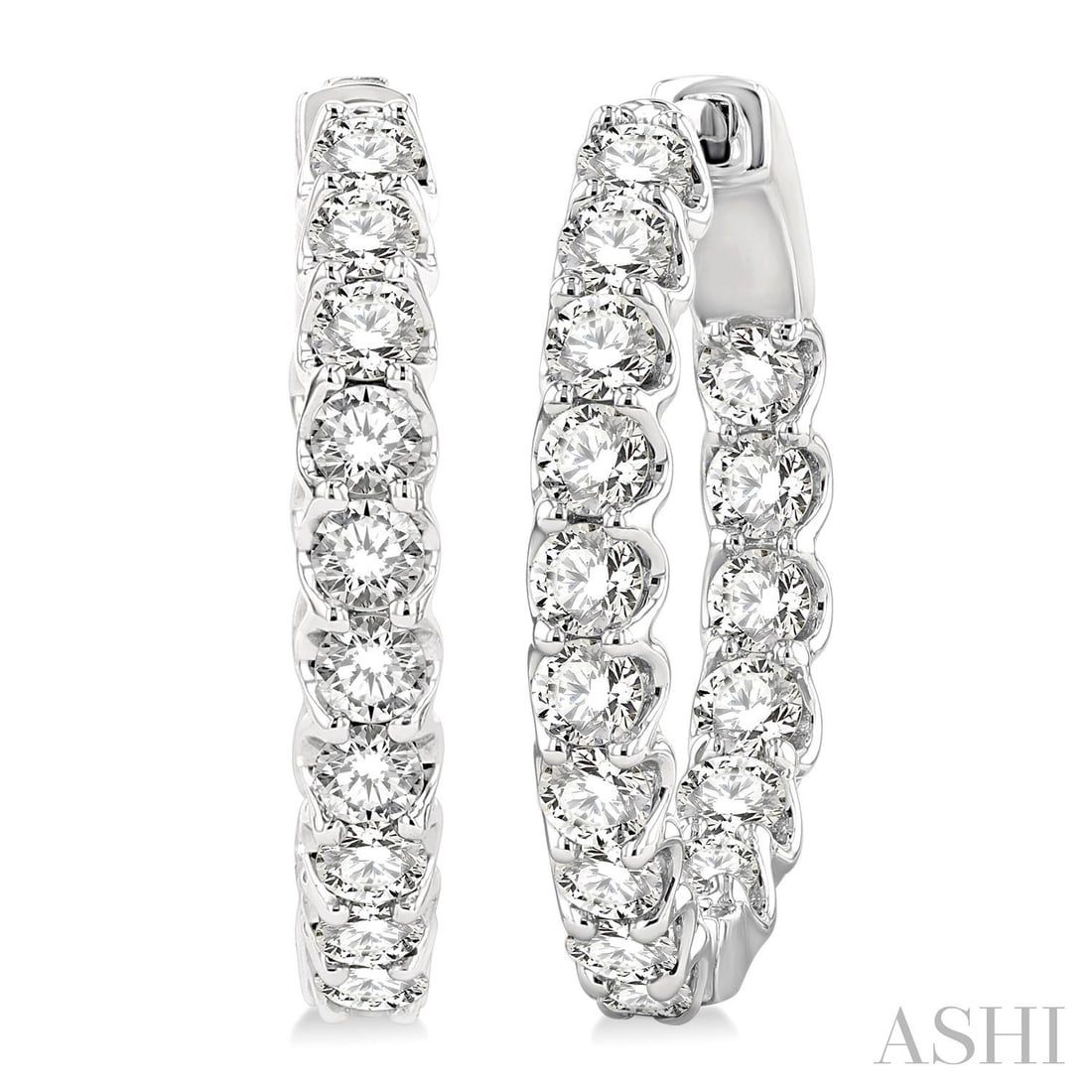 2.05 ctw Inside-Out White Diamond 14K White Gold Hoop Earrings: Captured in a moment of brilliance, this stunning Inside-Out Hoop pair of earrings featuring White Diamond speaks to the connoisseur. The gemstones are nestled within a Hoop framework, supported by a 