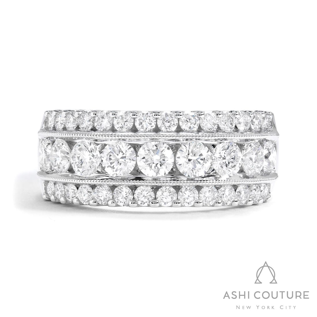 1.89 ctw Diamond 18K White Gold Band Ring: Epitomizing grandeur, this magnificent 3-Row band ring featuring White Diamond stands as a beacon of refined taste. Showcasing the gems in a Multi-Row Band arrangement, the band ring consists of 8.25 