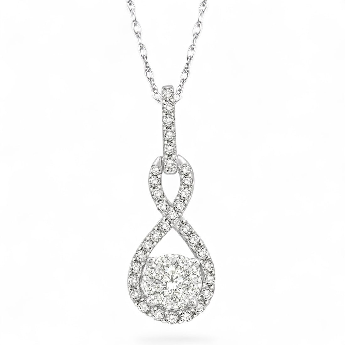 0.28 Ctw Winding Cluster Diamond Modern 14K White Gold Pendant - Certified: Rare and radiant, this stunning Winding Cluster pendant featuring Natural Diamonds offers a touch of the extraordinary. Showcasing the gems in a Cluster arrangement, the pendant consists of 1.1 grams 