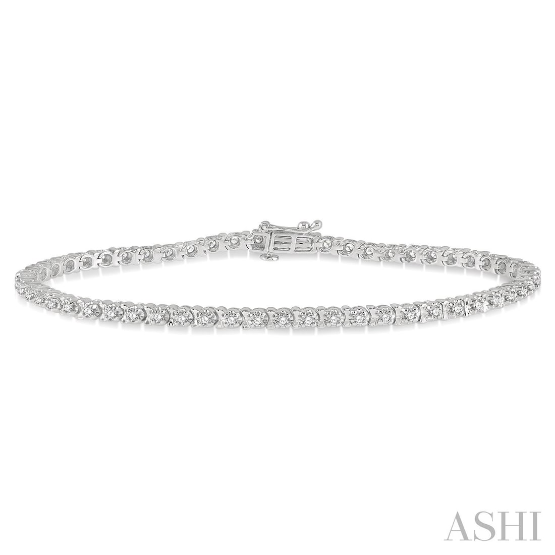 1.02 ctw Diamond 14K White Gold Tennis Bracelet: An exquisite masterpiece of haute joaillerie, this stunning Tulip bracelet featuring White Diamond is a true treasure. A detailed Continuous Line gallery secures the stones, rendered in 8.6 grams of l