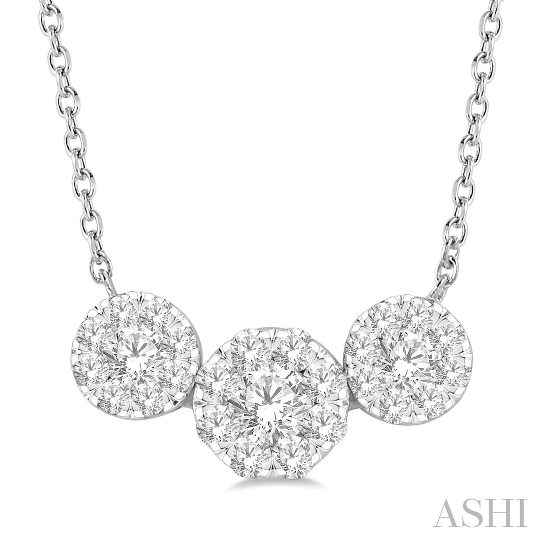 0.73 ctw Round Diamond 3-Stone Cluster Pendant Necklace 14K White Gold: A vision of luxury, this elegant Three-Stone Cluster necklace featuring White Diamond defines sophistication. Expertly mounted in a Three-Stone Cluster setting, the necklace is crafted in 1.15 grams o