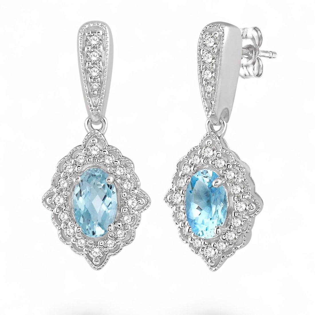 5x3 MM Aquamarine and 0.25 Ctw Oval White Diamond Modern 10K White Gold Earrings - Certified: A vision of luxury, this stunning Milgrain pair of earrings featuring Aquamarines, and Natural Diamonds defines sophistication. The gemstones are nestled within a Halo framework, supported by a substa