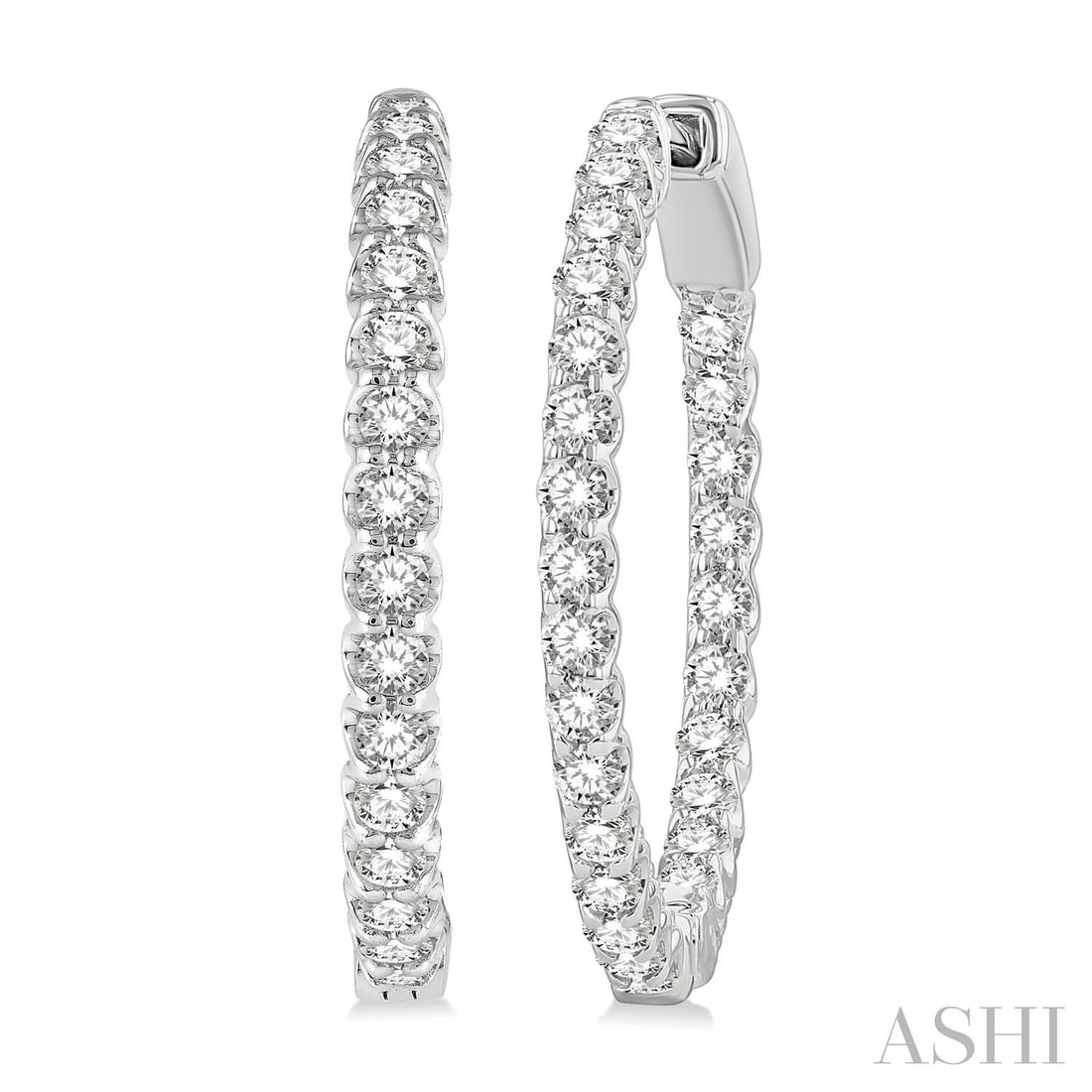 1.53 ctw Inside-Out Diamond Hoop Earrings 14K White Gold: Captured in a moment of brilliance, this stunning Inside-Out pair of earrings featuring White Diamond speaks to the connoisseur. Expertly mounted in a Shared Prong setting, the earrings are crafted in