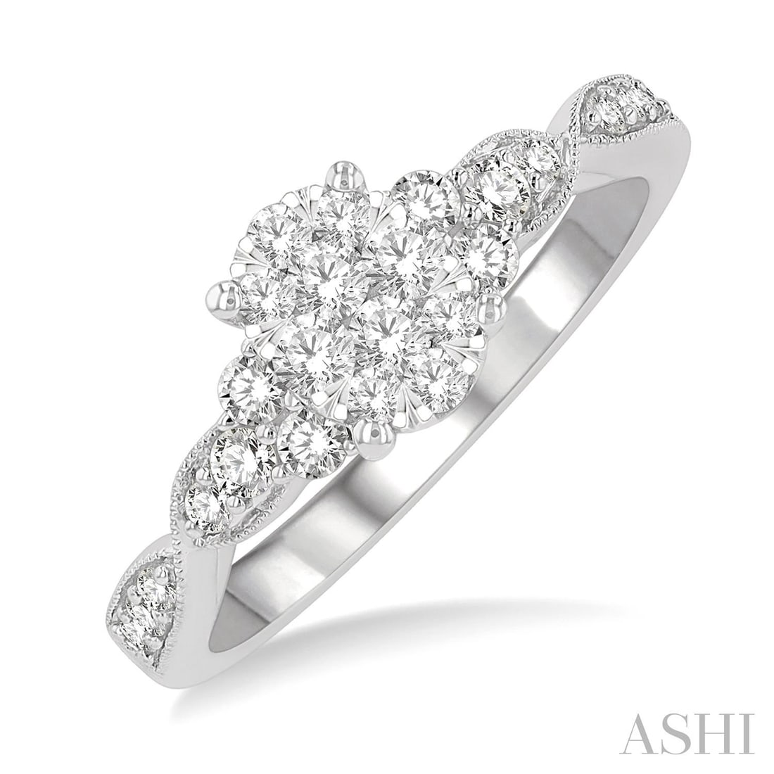 0.5 ctw Oval Cluster Diamond Criss Cross 14K White Gold Engagement Ring: A testament to superior craftsmanship, this exquisite Criss Cross Carved Shank ring featuring White Diamond is unparalleled. Showcasing the gems in a Cluster arrangement, the ring consists of 2.95 gra