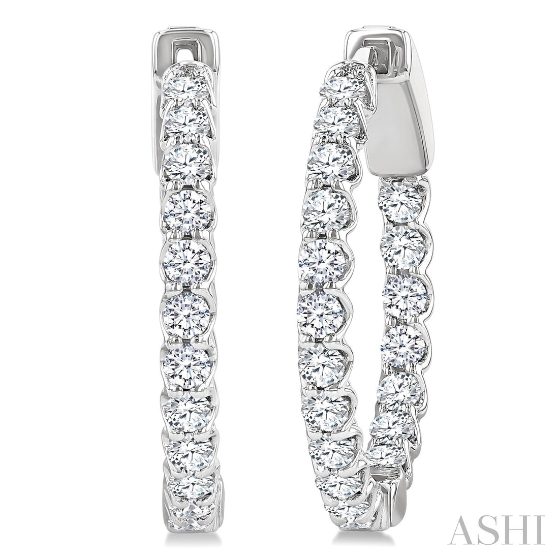 1.03 ctw White Diamond Inside-Out 14K White Gold Hoop Earrings: A vision of luxury, this elegant Inside-Out Hoop pair of earrings featuring White Diamond defines sophistication. The gemstones are nestled within a Shared Prong framework, supported by a substantial 