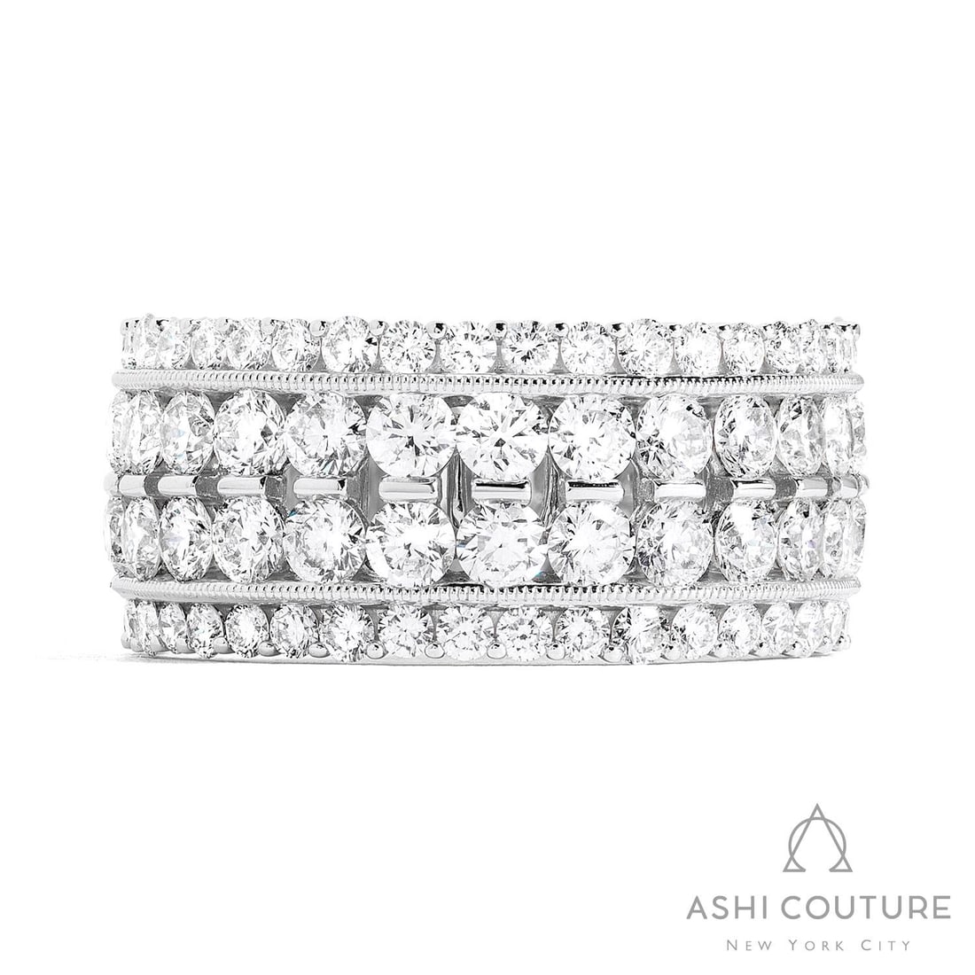 Duchess Classic 4-Row 3.80 ctw Diamond 18K White Gold Band Ring: An exquisite masterpiece of haute joaillerie, this breathtaking 4-Row Band ring featuring White Diamond is a true treasure. A detailed Multi-Row Shared Prong Band gallery secures the stones, rendered 