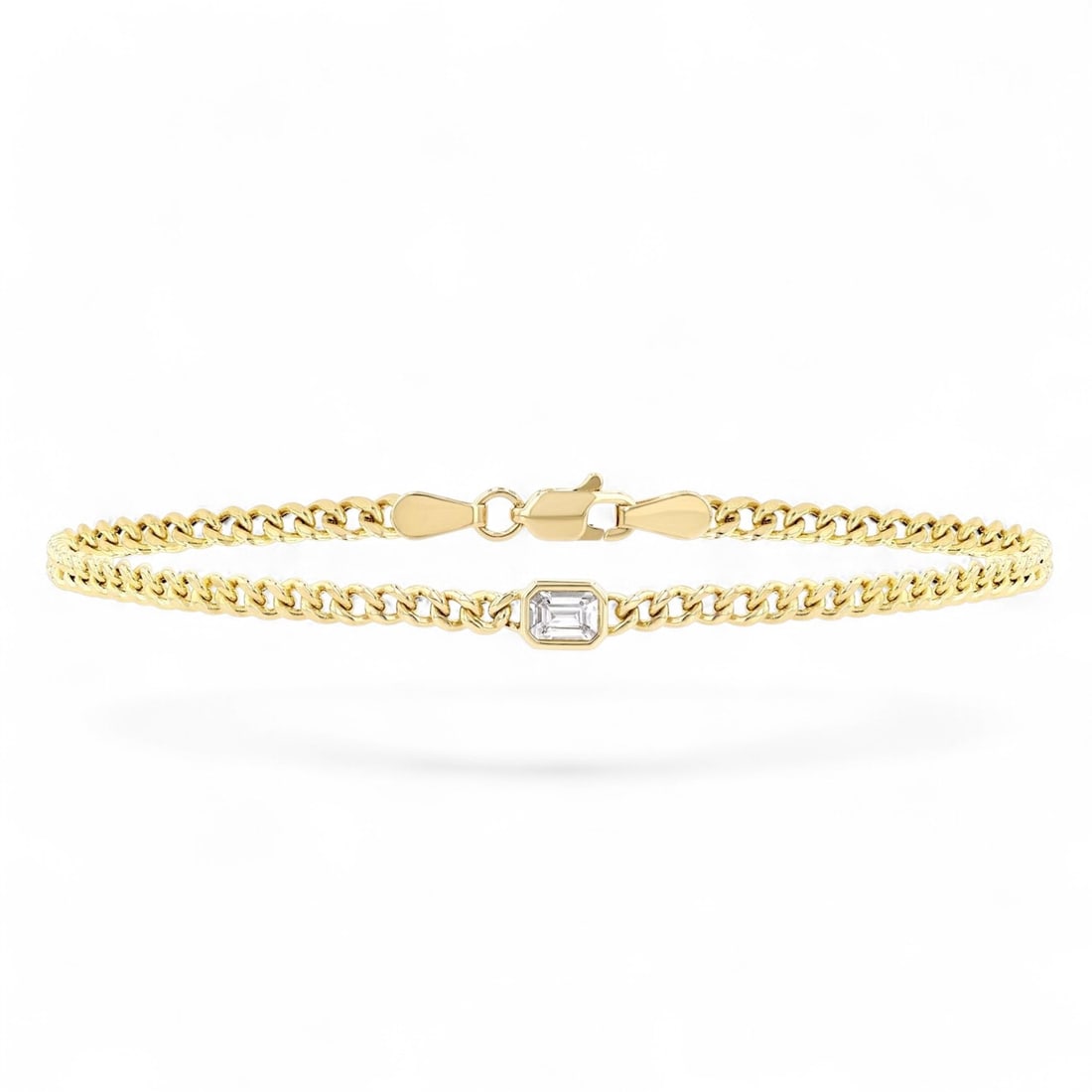 0.25 Ctw Emerald Cut Curb Link Diamond Modern 14K Yellow Gold Bracelet - Certified: Defining modern elegance, this magnificent Emerald Cut Curb Link bracelet featuring Natural Diamonds captures the essence of style. The gemstones are nestled within a Bezel framework, supported by a s