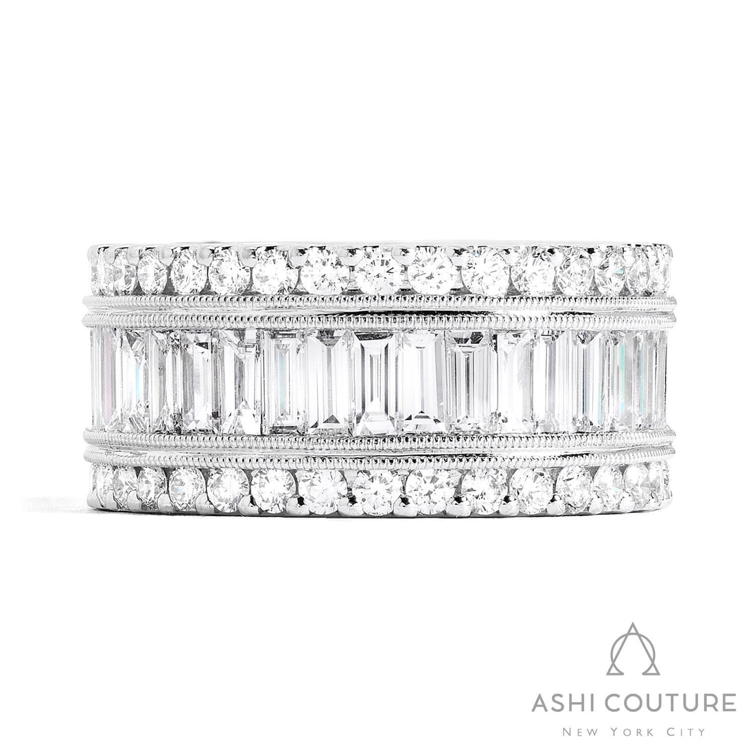 4.82 ctw Baguette and Round Diamond Eternity Band 18K White Gold: Timeless and sophisticated, this magnificent Eternity Band ring featuring White Diamond radiates enduring beauty. The gemstones are nestled within an Eternity Band framework, supported by a substantia