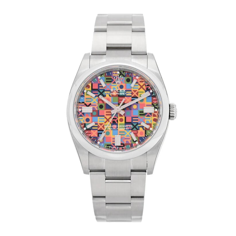 Rolex Oyster Perpetual 126000 Steel Colorful Motif Dial: The Rolex Oyster Perpetual, Reference 126000, presents a vibrant and modern interpretation of timeless horology. Highlighted by its striking Colorful Motif dial and framed by an elegant smooth bezel