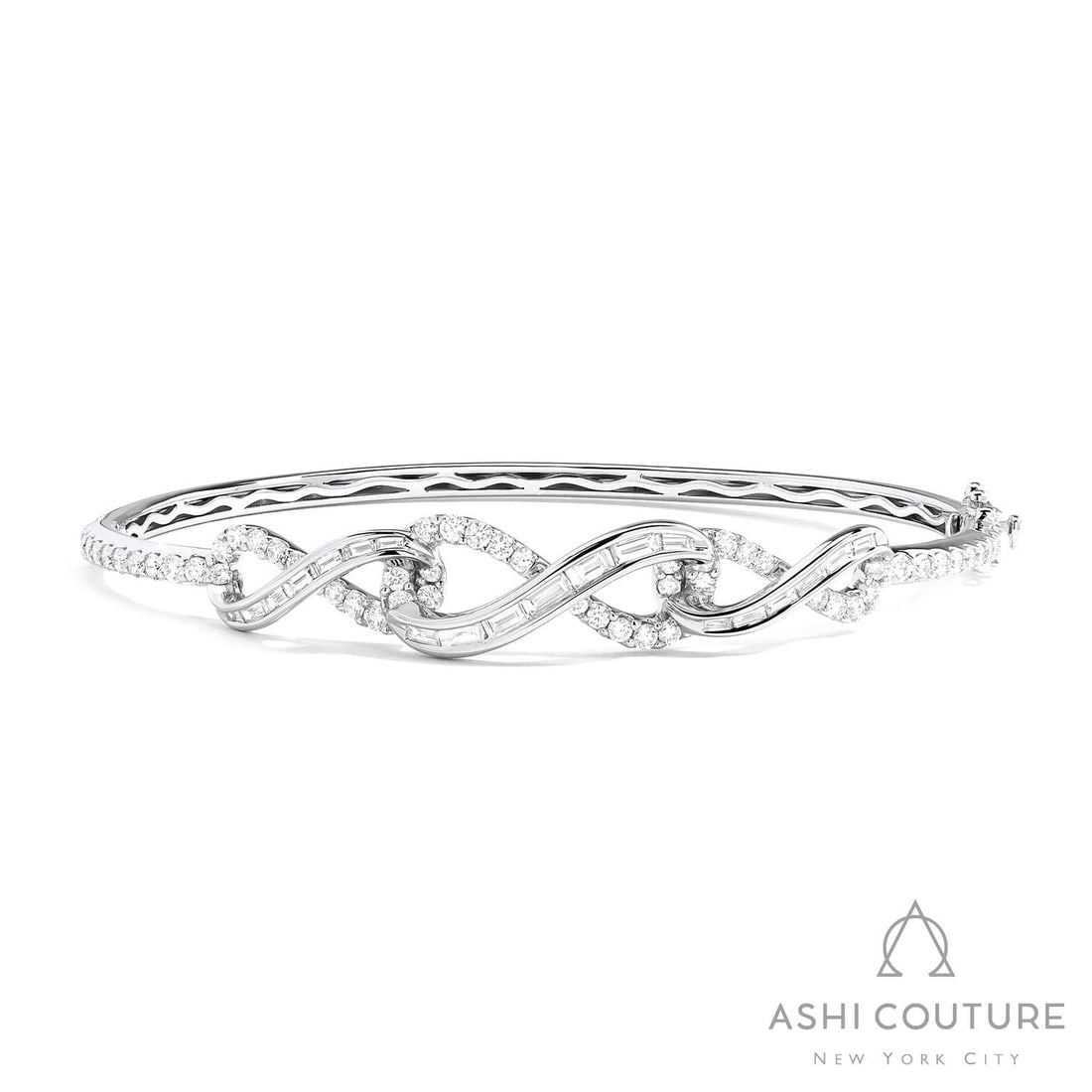 1.84 ctw White Diamond 18K White Gold Bangle: Retail Value: $16,890 A vision of luxury, this magnificent Infinity bracelet featuring White Diamond defines sophistication. The gemstones are nestled within an Integrated Channel and Pave Setting fra
