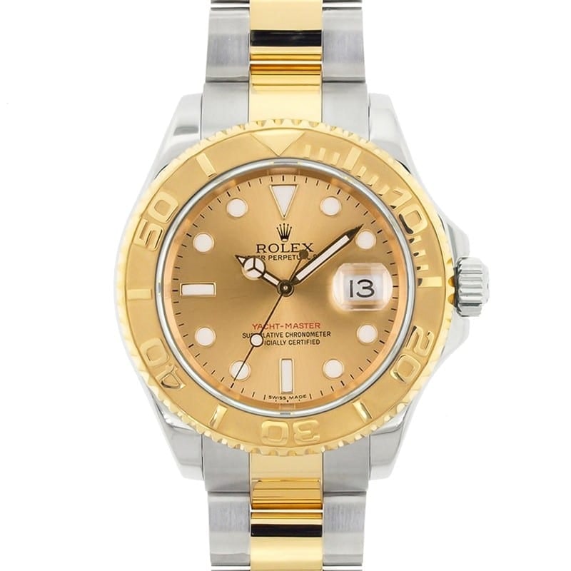 Rolex Yacht-Master 16623 Two-Tone Steel & Yellow Gold Champagne Dial: The Rolex Yacht-Master, Reference 16623, represents a harmonious fusion of nautical elegance and robust functionality. This timepiece showcases a refined two-tone aesthetic featuring a striking Champa