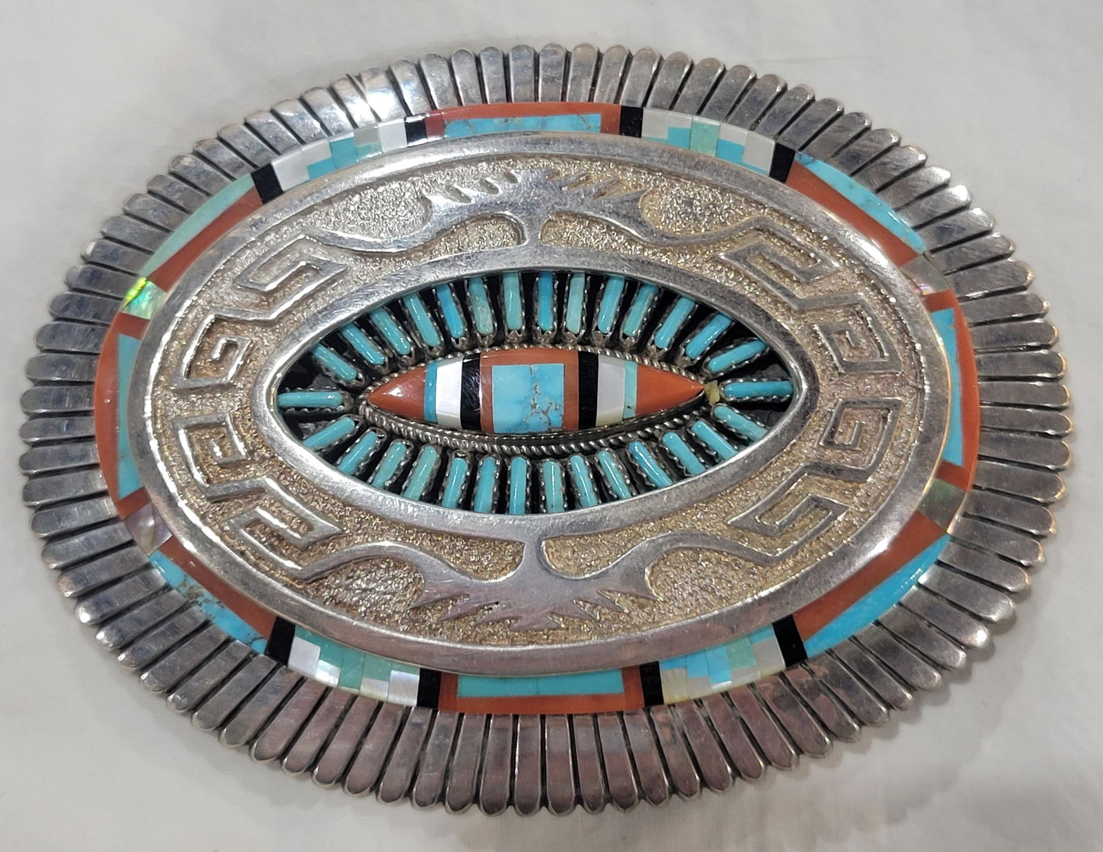 Vintage Zuni/Navajo Sterling Silver Belt Buckle: Vintage Zuni/Navajo Sterling Silver Belt Buckle featuring inlayed turquoise, coral and shell