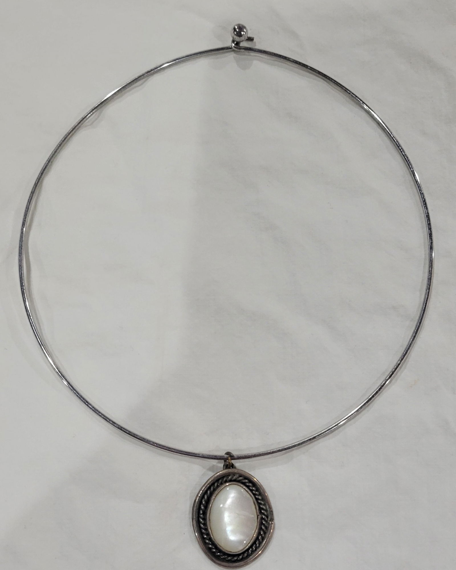 Silver-tone Flex wire choker necklace with mother of pearl oval pendant (1 of 5)