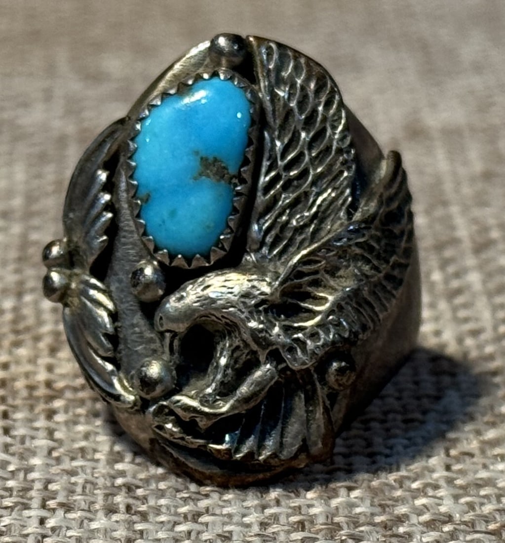 Native American Sterling Silver Ring features a Navajo-style eagle design with Turquoise Stone: Size 10.5+