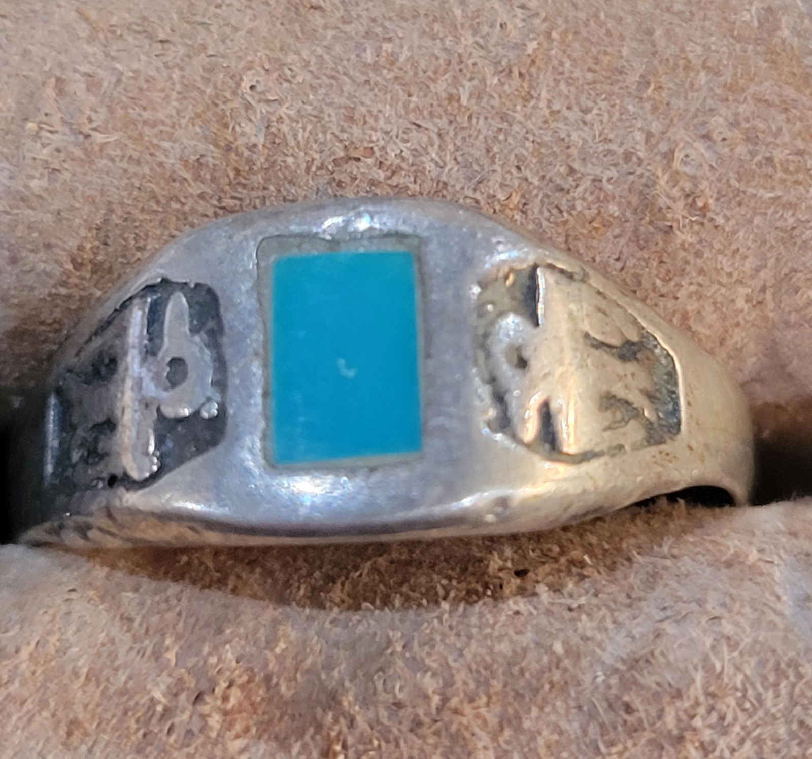Vintage Native American handmade sterling silver ring with thunderbird engravings: Vintage Native American handmade sterling silver ring featuring a turquoise inlay with thunderbird engravings - Size 7.5+