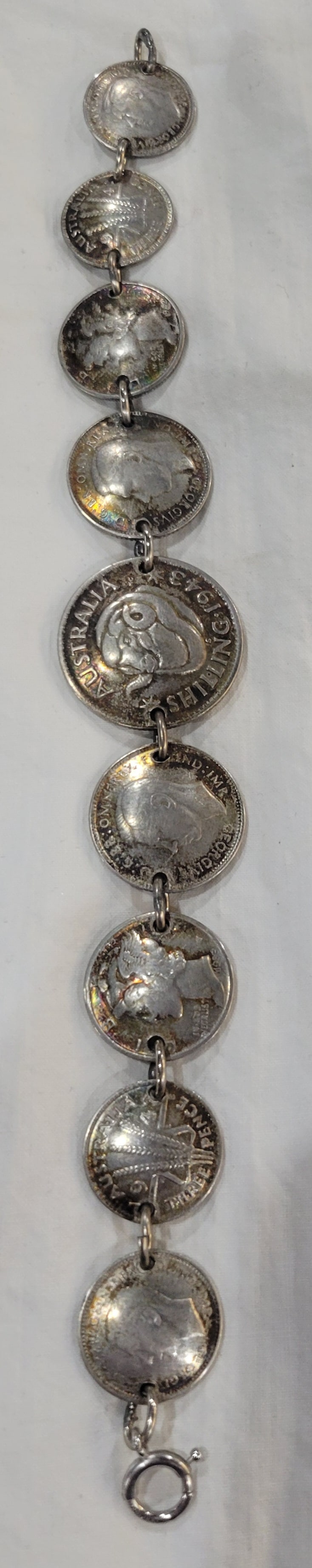 Vintage handcrafted Sterling Silver bracelet from Australia: Vintage handcrafted Sterling Silver bracelet from Australia - Features shilling and threepence denominations dated from early 1940's