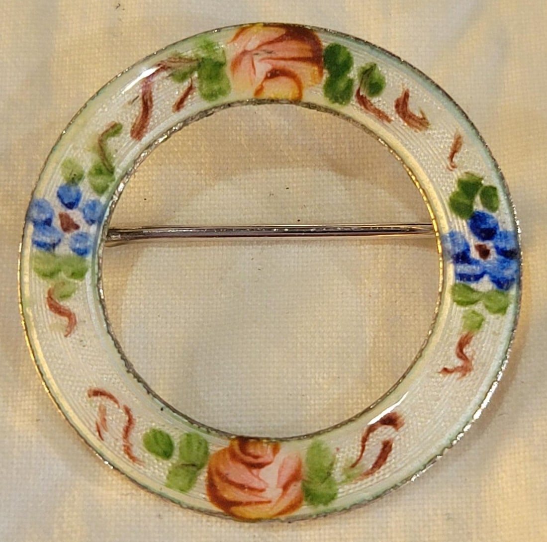 Vintage La Mode Sterling Silver circle brooch pin: Vintage La Mode Sterling Silver circle brooch pin featuring guilloche enamel with hand-painted pink roses and blue flowers - Sterling Silver with white enamel background floral wreath circle brooch