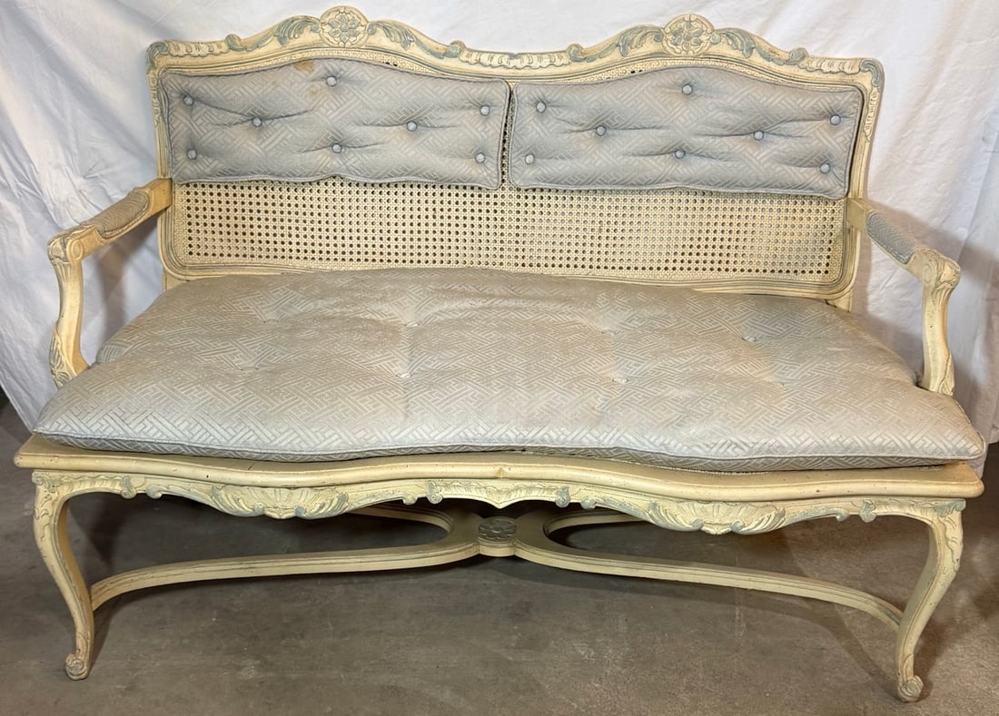Vintage French Provincial Louis XV Style Cane Back Settee / Loveseat: Vintage French Provincial Louis XV style cane back settee/loveseat with carved wood frame and classic detailing. Measures approx. 51” wide, 25” deep, 32” tall. Beautiful statement pi