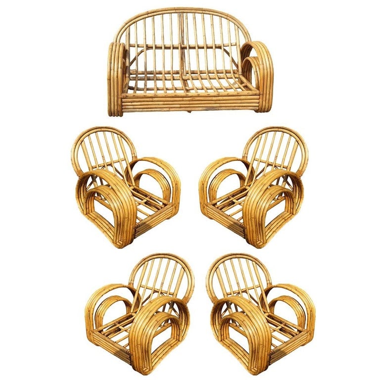 Restored 4-Strand Double Arch Speed Arms Rattan Sofa & Chairs Livingroom Set: This beautifully restored rattan living room set blends style and vintage charm with modern comfort. Made in 1950, this five-piece living room set showcases a rare 4-strand double-arch arm design. The