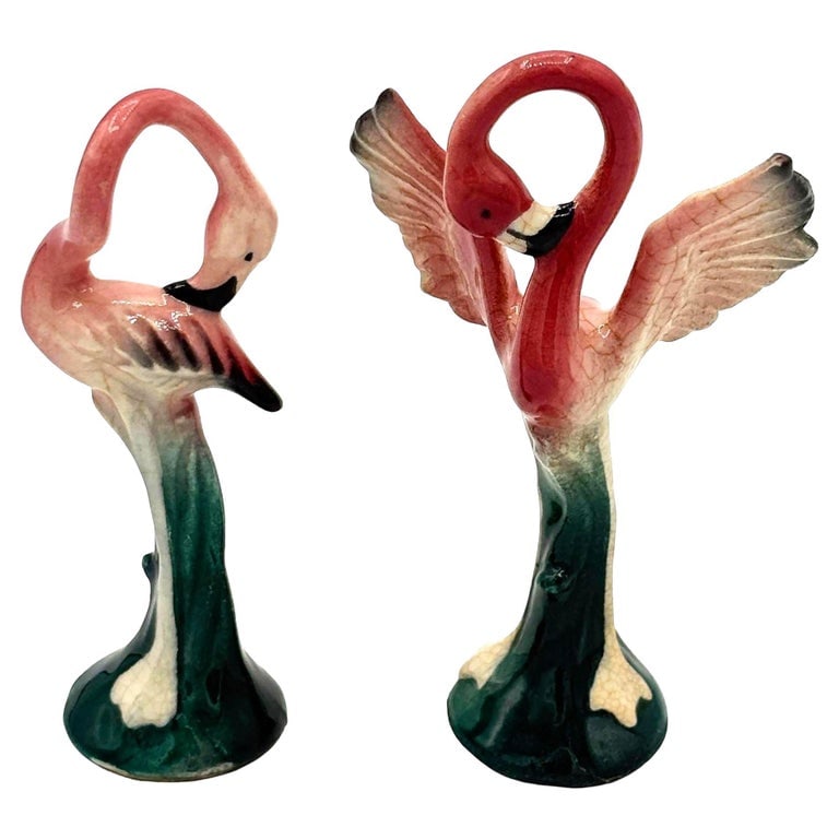 Mid-century California Pottery Ceramic Miniature Pink Flamingo Tabletop Statue: Mid-century pink and green miniature ceramic flamingo tabletop California pottery vase set of matching His and Her set . The set features two beautifully detailed pink flamingos in lush green leaves a