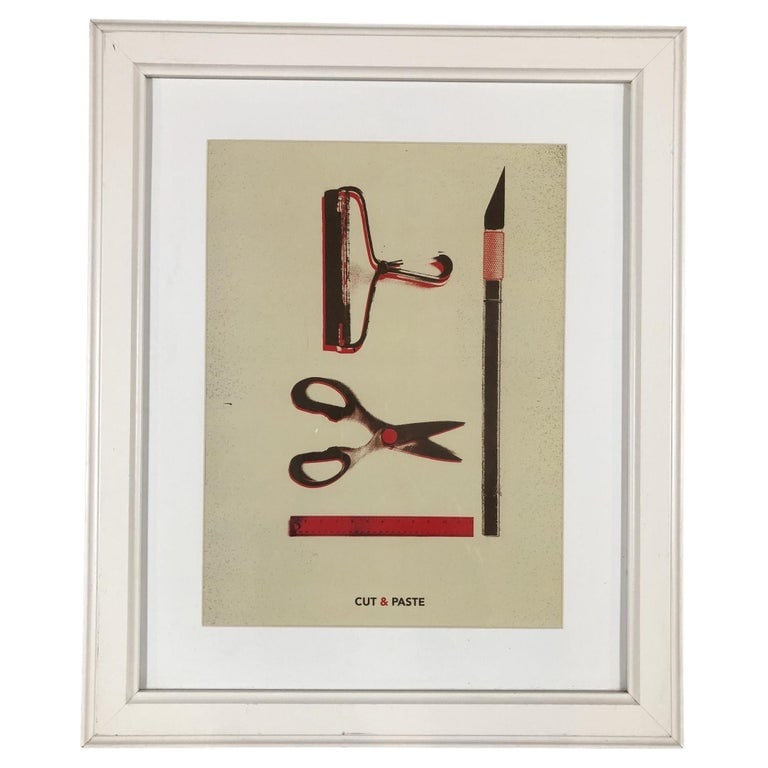 Modern Office Supplies Collage Three Dimensional Art Print "Cut and Paste": Modern style collage style art print is made to look Three-dimensional, with the words "cut and paste." The artist is unknown and the artwork print comes unsigned. Art has a scissor, an Exacto knife,