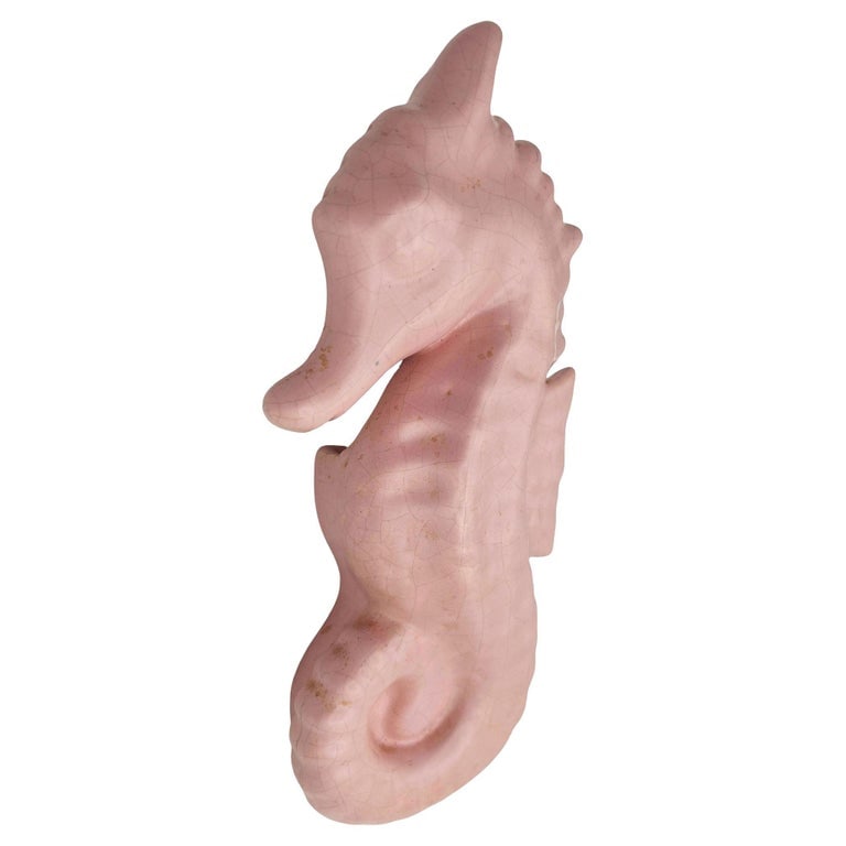 Rare Mid-century Ceramic California Pottery Pink Seahorse Flower Wall Vase: Mid-century pink ceramic Seahorse flower wall vase. The wall vase features a beautifully detailed pink Seahorse with a back pocket for holding flowers. It comes in matte finish for a laidback look, ma