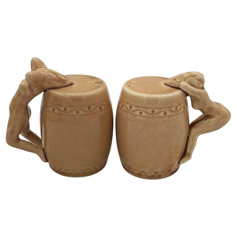 Strip Tease- Eye Appeal Ceramic Barware Salt & Pepper Shaker by Dorothy Kindel: A fabulous set of 6 "Strip Tease- Eye Appeal" ceramic barware Salt & Pepper Shaker by Dorothy Kindell, circa 1940s. This hard-to-find complete set features 2 women hanging off the shaker in all stages