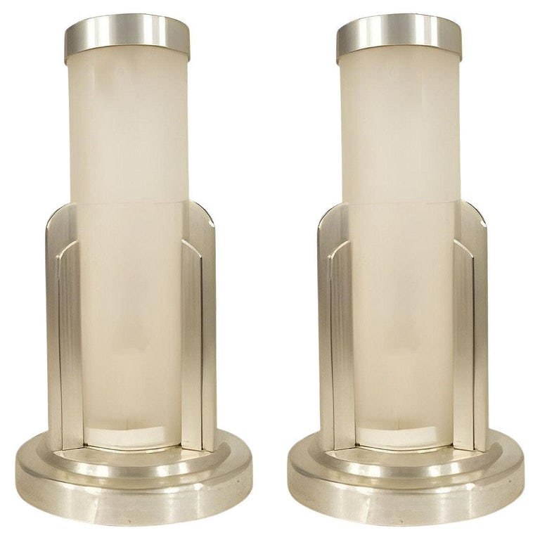 Streamline Machined Aluminum Cylinder Café Table Lamp Pair by Saturn Lighting: Streamline stepped aluminum cylinder table lamp featuring a frosted acrylic cylinder shade in the center resting on top of hand-machined stepped Art Deco style base with 3 stepped pillars that hold th