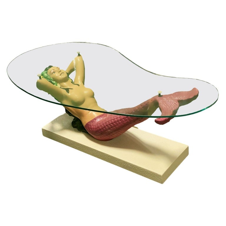 Mid-Century Sculptural Nude Mermaid Cocktail Table w/ Biomorphic Glass Top: Rare, fully restored nude female mermaid coffee/cocktail table with a sculptural composite base featuring an impressive nearly 4-foot-long mermaid. The figure appears to be floating gracefully toward