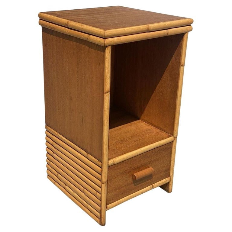 Restored Mid-century Single Drawer Stacked Rattan & Koa Wood Bedside Table: This beautifully restored 1950s rattan and koa wood bedside table blends style with vintage charm, and modern comfort. the table features rattan trim and a single drawer. The table features a stacked