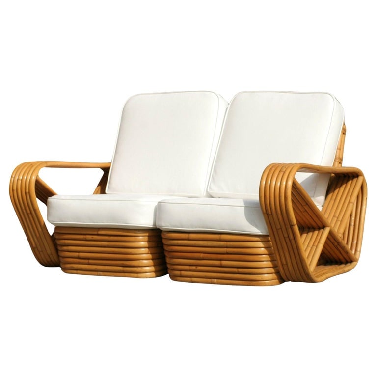 Restored Paul Frankl Six-Strand Square Pretzel Stacked Rattan Loveseat: Paul Frankl Styled Six-strand square pretzel arm rattan loveseat. This two-seat dates from the 1930s. Cushions made to order, brand new. White vinyl is available or custom-requested in the fabric of y
