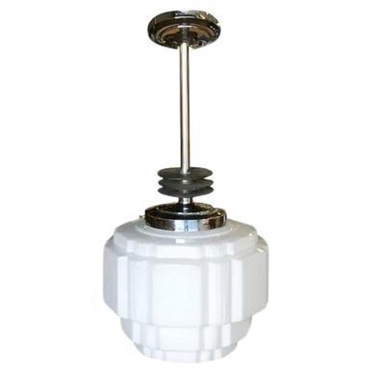 Art Deco Ceiling Pendant with School House Stepped Glass Globe: Rare Art Deco chrome ceiling pendant with enameled black streamline accents and stepped milk glass geometric school house style glass globe with hand-painted Art Deco design.Dimensions of light are 16