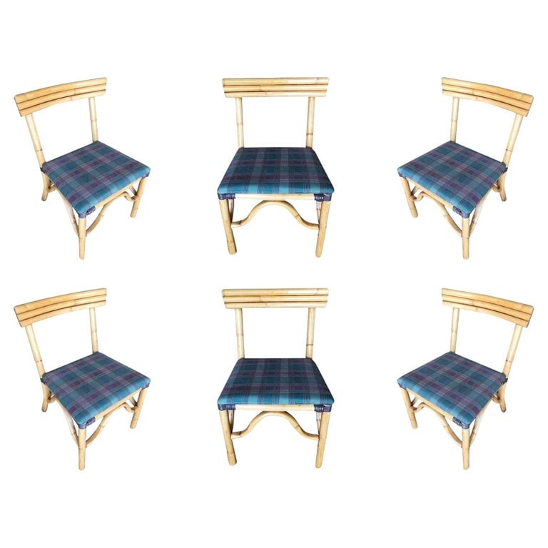 Restored Midcentury Rattan Dining Side Chair with Three-Strand Back, Set of Six: Vintage rattan dining room side chair with three-strand "Speed" back, included is a set of six chairs. Each chair features a three-pole rattan "Speed" back seat back with the original barkcloth seat.R