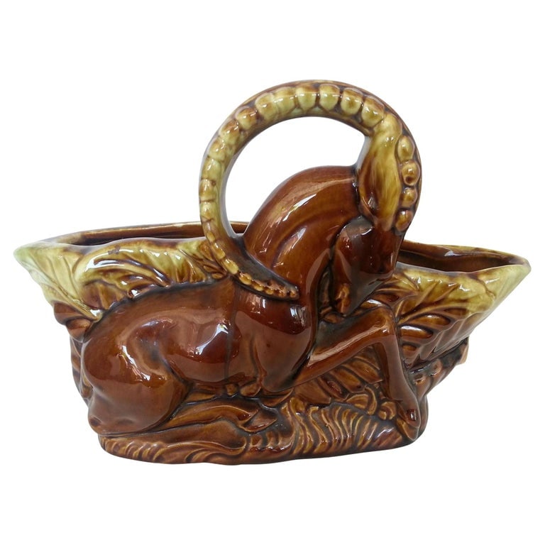 Mid-Century Kneeling Antelope TV Lamp: TV lamps are a particularly iconic type of vintage home decor. Manufactured primarily in the 1950s and early 60s these little lamps were designed to sit on top of the television and shine against the