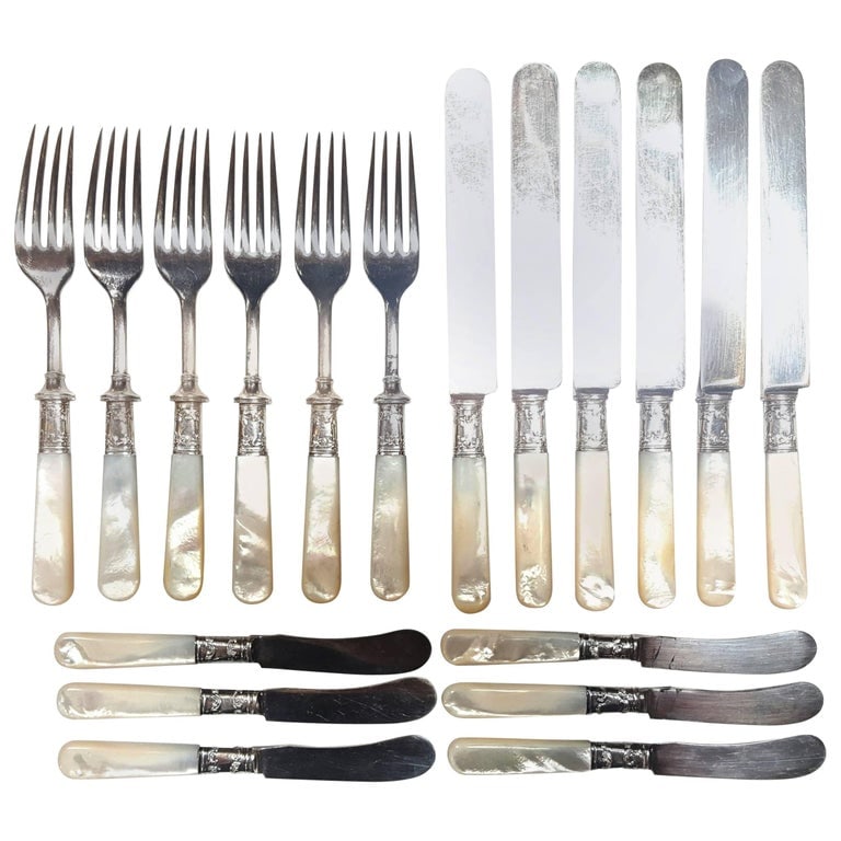Antique Fish Flatware Set, Sterling Silver with Mother-of-pearl, Set of 18: Antique fish flatware set, sterling silver with mother-of-pearl, set of 18Landers, Frary & Clark Fish Set - Aetna WorksQty: Set of 18 pieces (as pictured) six dinner forks, six dinner knives and six b
