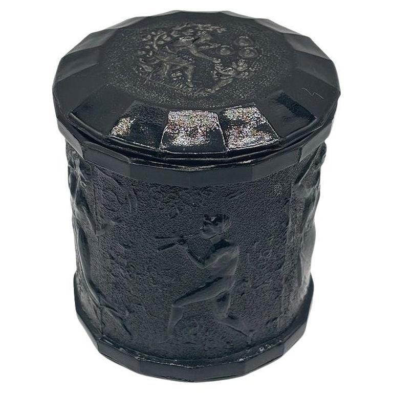 1937 L.E. Smith Dancing Nymphs & Saytr Black Amethyst Glass Canister w/ Lid: Original 1937 L.E. Smith Dancing Nymphs black glass vanity jar with the original matching lid. This jar features raised figures of nymphs and Pan, gracefully banded around the lower portion The design