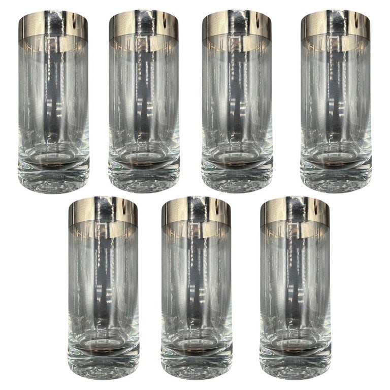 Set of 7 Barware HighBall Tumbler Glass w/ Silver Rim by Dorothy Thorpe: This exquisite set of seven Tom Collins silver barware cups by Dorothy Thorpe epitomizes elegance in Mid-century modern. Each cup features a sleek, streamlined design crafted from high-quality silver-