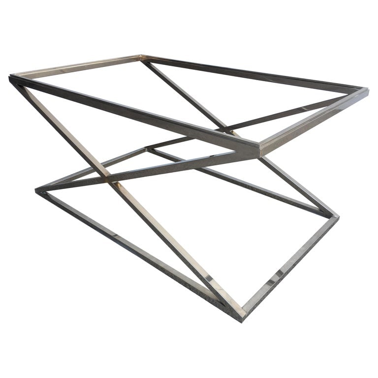 Granger Hertzog Attributed Chrome X Base Glass Top Coffee Table: Chrome "X" base glass top coffee table with a glass top. Attributed to the designer Granger Hertzog.