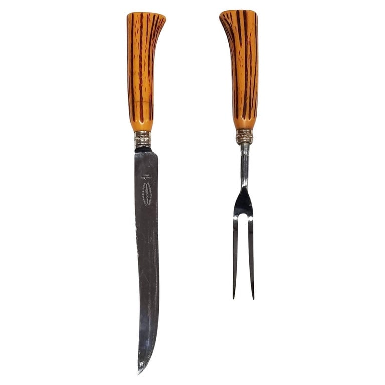 Vintage Sheffield England 2-Piece Grilling Set with Faux Antler Handles: Elevate your farmhouse-style grilling experience with this vintage Sheffield, England grilling set. This (2) piece set, boasting retro faux antler handles and bakelite accents, epitomizes timeless cha
