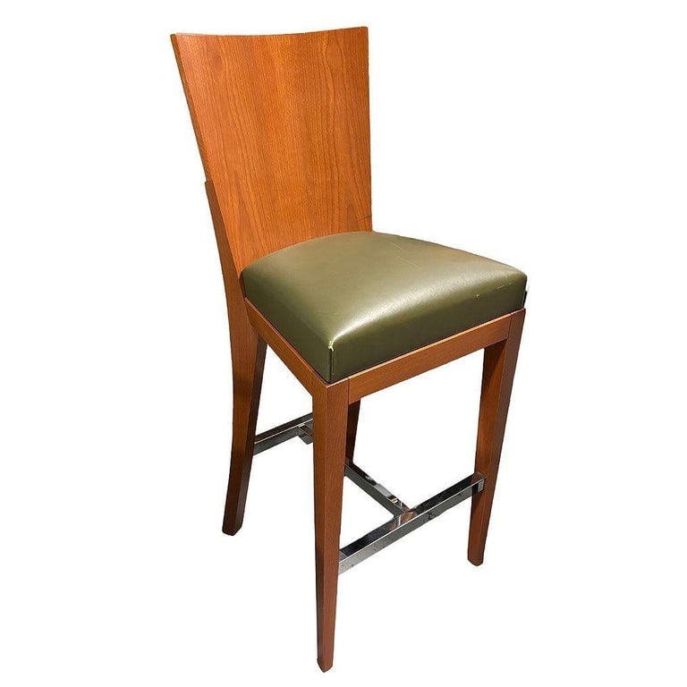 Dakota Jackson Bentwood "Cadette" Barstool: Dakota Jackson designed barstool part of the "Cadette" Collection inspired by a cadet’s uniform. The stool features a Kiln-dried hardwood frame, glued, doweled, and corner-blocked in a Satin finish.