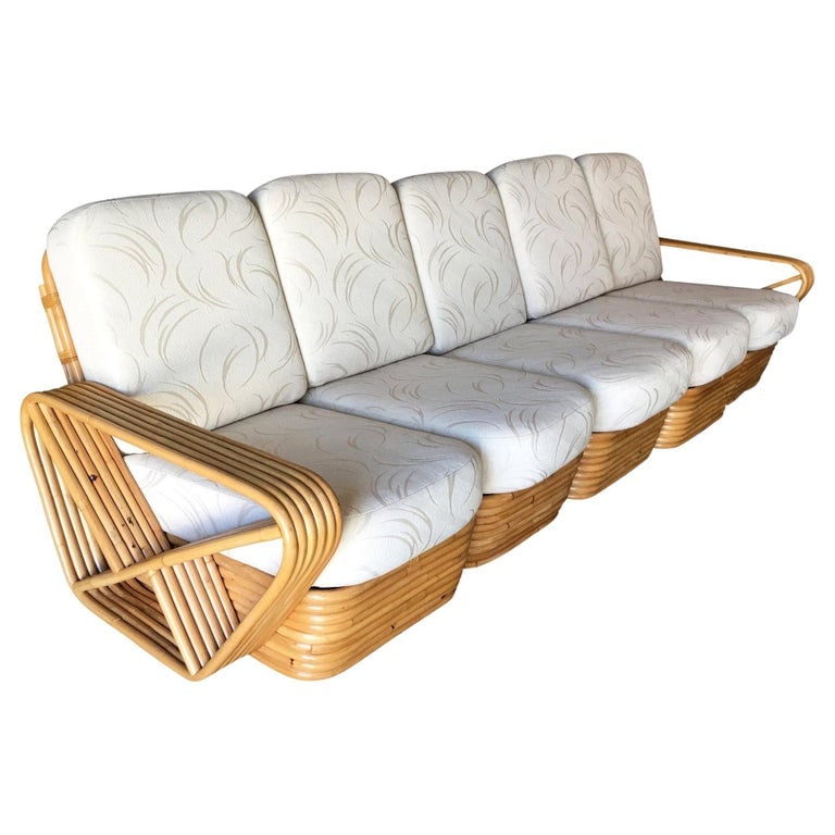 Restored Art Deco Six-Strand Square Pretzel Five-Seat Sectional Sofa: Art Deco six-strand square pretzel style, five-seat sectional sofa. This sofa features the famous six-strand square pretzel side arms and stacked rattan base originally designed by Paul Frankl. The