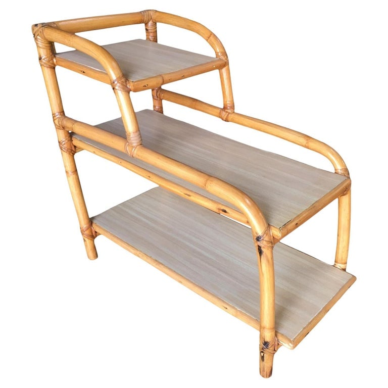 Restored Three-Tier "Arch" Side Table W/ Blond Formica Tops: Original 1950s "Arch" rattan side table with three-tier Formica tops.1950, United StatesWe only purchase and sell the best and finest rattan furniture made by the best and most well-known American des