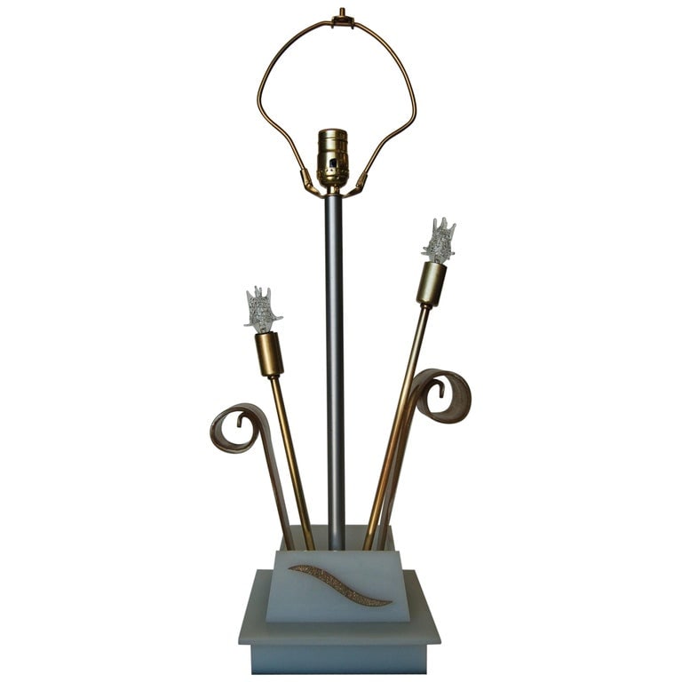 Gold Glitter Scrolling Acrylic Star Table Lamp by Moss Lighting: Midcentury gold glitter scrolling acrylic table lamp by Moss Lighting. The lamp features a center standard socket and accent 7w brass sockets along the side.Period style star bulbs included. Measure