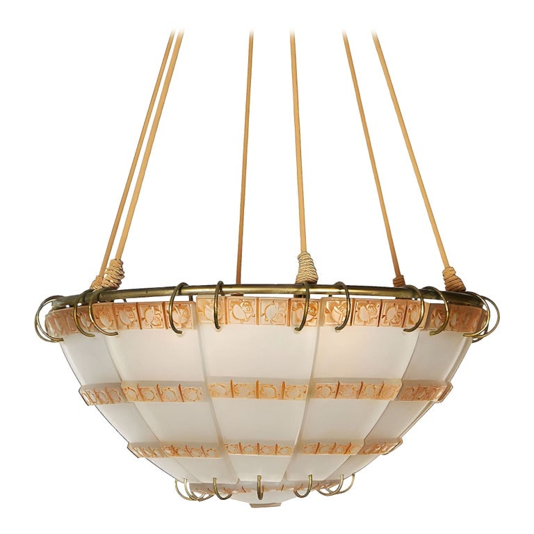 Art Deco "Bande de Roses" Frosted Art Glass Chandelier by Rene Lalique: Created in 1924, this “Bande de Roses” chandelier by René Lalique has clear and frosted glass in a tapering circular form that is heightened with coral patina and decorated with graduated ban