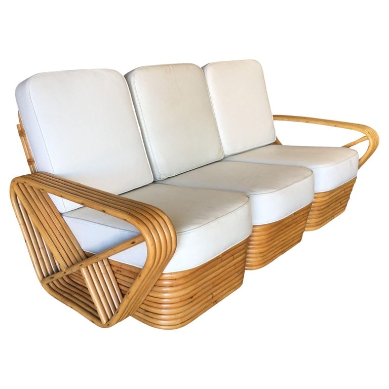 Art Deco Five-Strand Square Pretzel 3-Seater Sectional Sofa: Art Deco era five-strand Paul Frankl-inspired square pretzel style, three-seat sectional sofa. This sofa features the famous five-strand square pretzel side arms and stacked rattan base.Measures:Sofa: