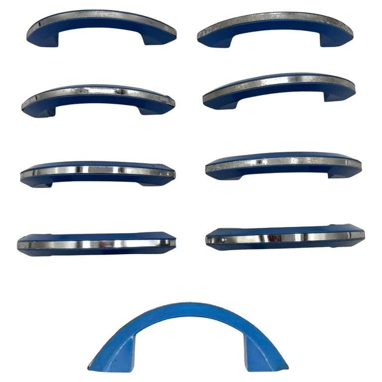 Art Deco Sky Blue Catalin/Bakelite Drawer Pulls w/ Chrome Strip, Set of 9: Set of 9 candy sky blue Catalin (colored Bakelite) drawer/door pull knobs each with a chrome strip down the center. Complete your period kitchen cabinetry with these classic Art Deco-era with a