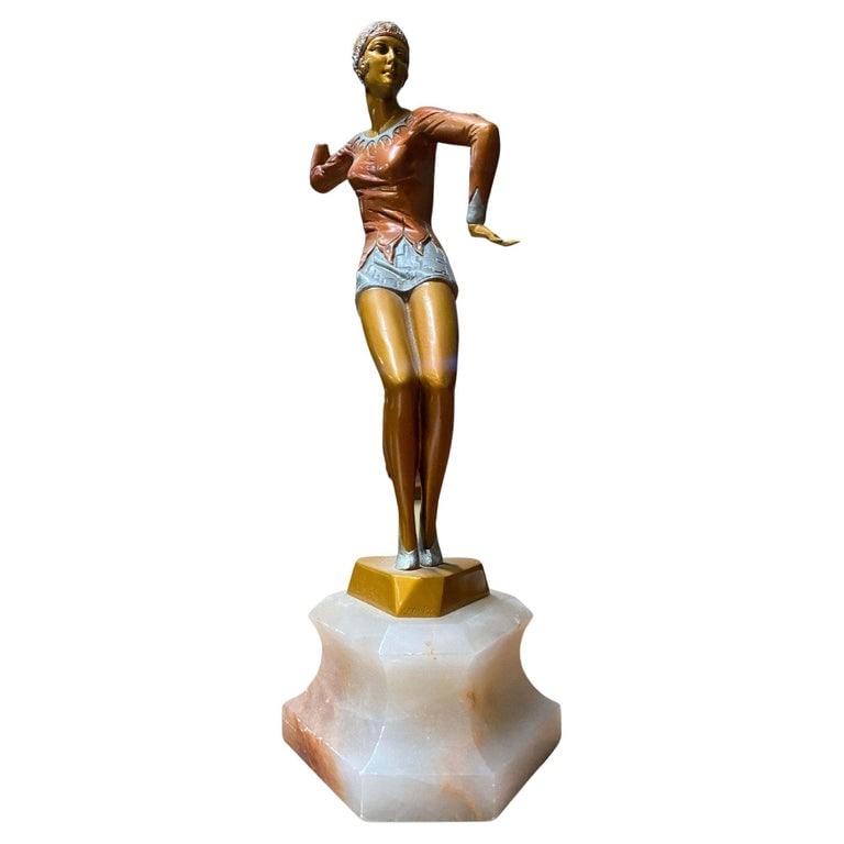 Neo Art Deco Copper-Tone Female Dancer Statue Dancer by Biess: Neo Art Deco copper-tone female flapper dancer statue dancer fixed to an alabaster base, signed Biess. Circa 1980.