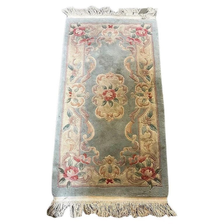 5' Foot X 2' Foot Deep Pile Aubusson Rug with French Roses design: Medium-sized 5' 10" x 2' 3" Deep Pile Aubusson wool on cotton Rug with French Roses design featuring a blue and tan design with pink and red rose floral design throughout.Messurments 58" X 27"France,