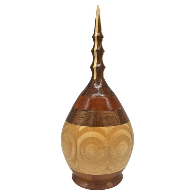 Hand Carved Marquetry Inlay Pear Shaped Vessel with Lid: Presenting a stunning Hand Carved Marquetry Inlay Pear Shaped Vessel with Lid. Crafted with precision and care, this exquisite vessel showcases intricate marquetry inlay, adding a touch of artistry an