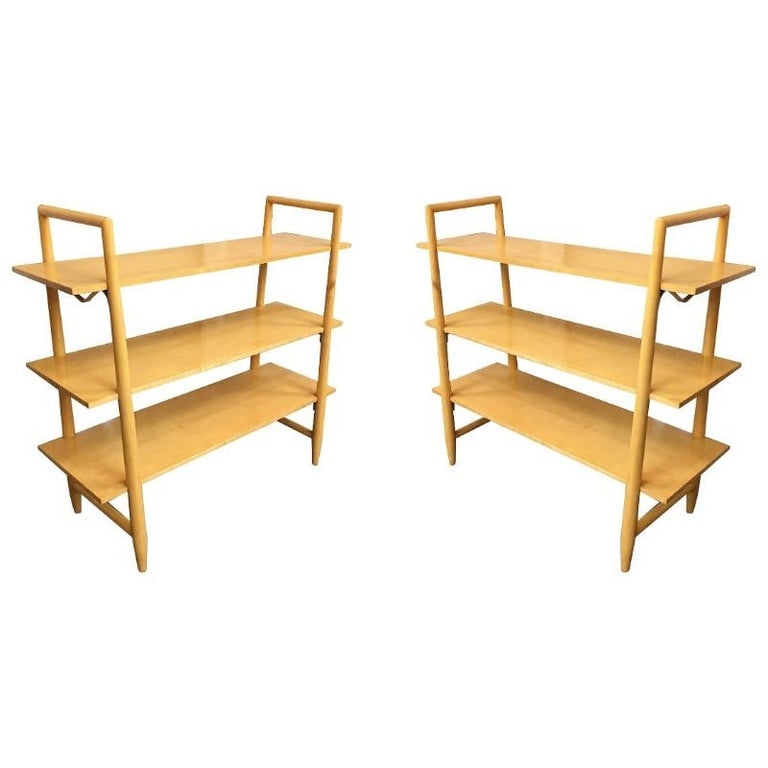Swedish Midcentury Bookshelf by Edmond Spence: Swedish-made blonde Mid-Century Modern bookshelf pair with three floating shelves each designed by Edmond Spence for Walpole. Attractive joinery and a very usable size with great detail. The turned su